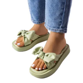 Green platform sandals with a bow from Edvard